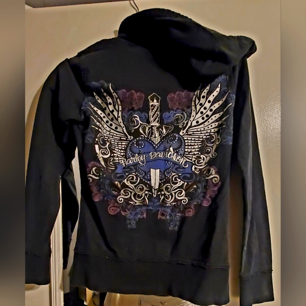 Harley Davidson zip up hoodie with details on front and back.